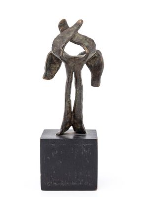 A BRONZE SCULPTURE. On a solid wood block. 8.4" tall.