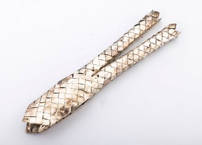 A STERLING SILVER LULAV HOLDER BY NETAFIM. Israel, C. 1990. Woven, like a regular lulav holder 