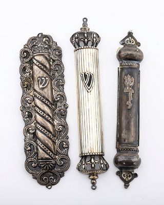 A GROUP OF THREE STERLING SILVER MEZUZAH COVERS. Mostly Israel, 1990's. The largest is 7.5" 