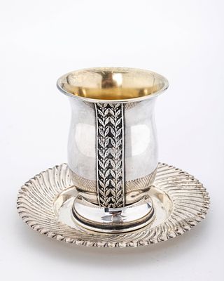 A STERLING SILV ER KIDDUSH CUP WITH UNDERPLATE. PROBABLY Israel, c. 2000. Baluster in shape 
