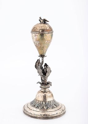 A LARGE SILVER SPICE CONTAINER. Most likely Poland. On a round hand chased base with floral an 
