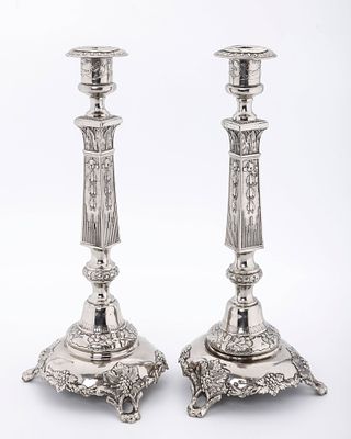 A MASSIVE PAIR OF RUSSIAN SILVER CANDLESTICKS BY JOSEF EHRELICH, Warsaw, c. 1890. On grapevine 