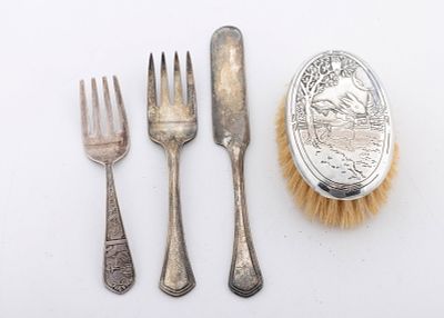 A GROUP OF FOUR STERLING SILVER CHILDREN'S UTENSILS - TIFFANY. Includes two forks and one knife 