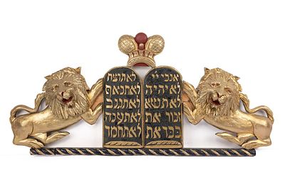 A PAIR OF WOODEN TORAH ARK LIONS. American, early 20th century. Outwardly facing lions that 