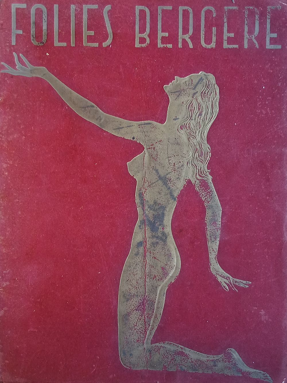 חוברת משנות ה 50 של תוכנית המופע פולי ברזר בפריז 
עטיפה עשויה קטיפה אדומה עם דמות מוזהבת