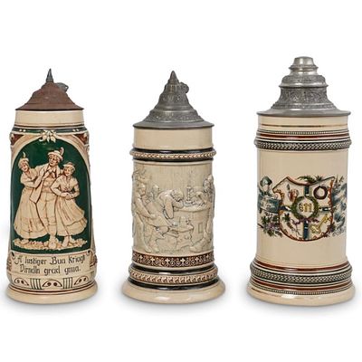 Lot of 3 Antique German Ceramic Beer Steins. A group of three German beer steins each decorated 