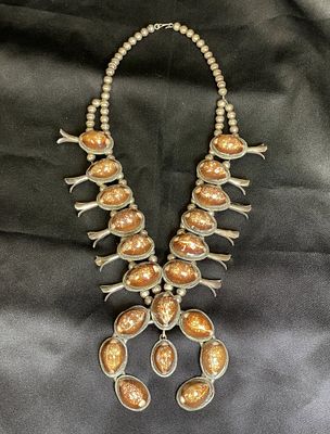 Signed Native American Sterling Silver Necklace. A rare squash blossom necklace decorated with