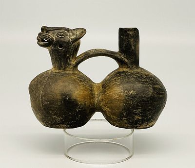 Pre-Columbian Chimu Blackware Double-Chambered Stirrup. Pre-Columbian, Central Coast Peru, Chimu