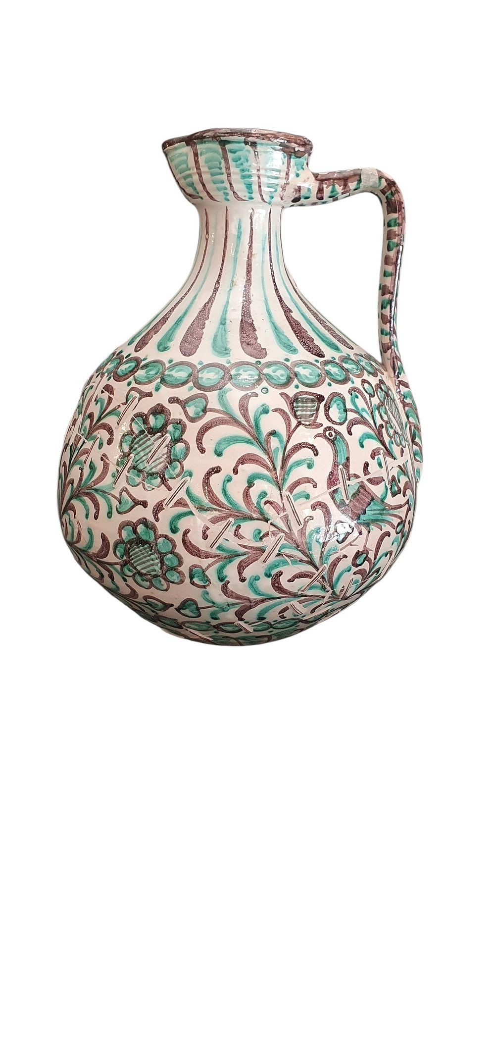 Jarra o bombona tornada, años 30. Cerámica de Fajalauza - Granada, vidriada o esmaltada en blanco, verde y marrón manganeso representando pájaros, girasoles, granadas y temas florales., lote 4