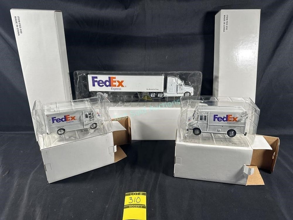 Lot 310: FedEx Diecast Trucks
