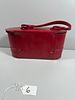 A Vintage-Style Red Bag- 4.5" tall. A vintage-style, hard-sided bag, presenting in a glossy Image - 1