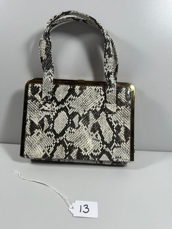 Mid-20th Century Black and Off-White Snakeskin Top. A structured top-handle handbag, likely 
