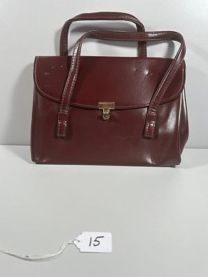 A Vintage Brown Patent Leather Handbag. A vintage structured women's handbag, crafted from a 