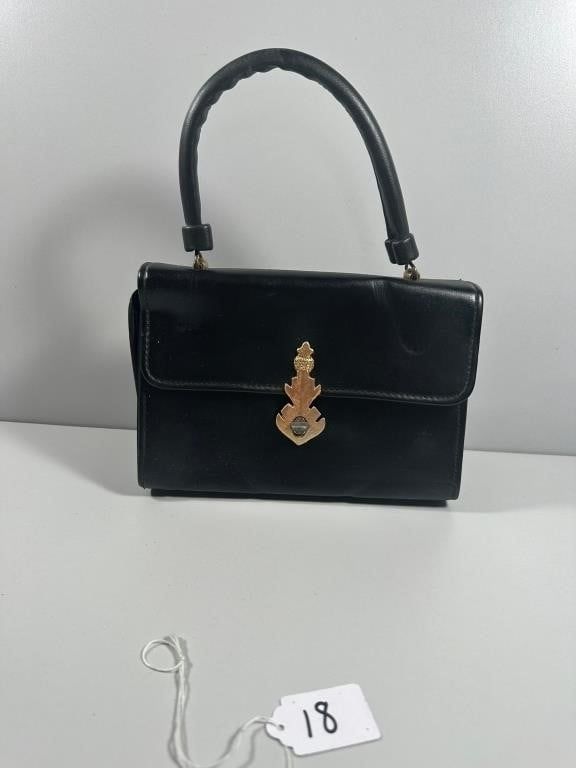 A Grenada Vintage Black Leather Top-Handle Handbag. A Grenada vintage black leather top-handle 