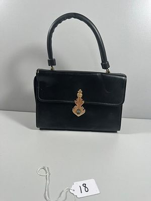 A Grenada Vintage Black Leather Top-Handle Handbag. A Grenada vintage black leather top-handle 