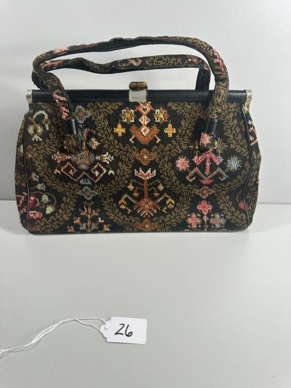 A Vintage Floral Tapestry Top Handle Frame Handbag. A vintage floral tapestry top handle frame 
