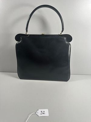 A 1960s Etra Black Leather Handbag. A vintage Etra black leather handbag, circa 1960s, featuring 