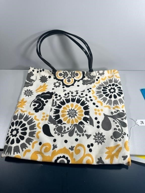 A Contemporary Fabric Tote Bag with Floral and Abs. A contemporary fabric tote bag, likely of a 