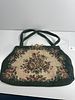 Vintage Floral Tapestry Needlepoint Handbag. A vintage ladies' handbag or purse, constructed Image - 1