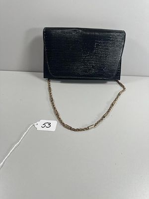 Ande Black Embossed Reptile Texture Clutch with Go. An Ande black clutch-style handbag 