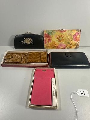 A Collection of Five Assorted Wallets and Clutches. A collection of five small accessories 