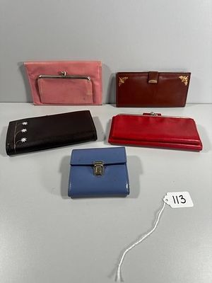 Five Women's Wallets, including Nine West. This lot comprises five women's wallets, primarily 
