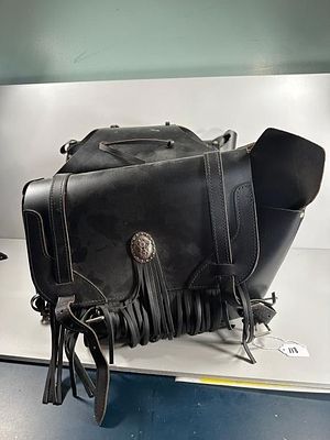 A Pair of Leather Saddle Bags. A pair of leather saddle bags. Constructed from black leather in 