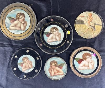 6 Cherub Flue Covers. Top Right has no framing