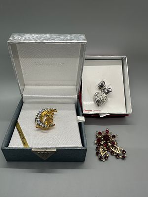 A Trio of Crystal and Stone Brooches and Pendants. A trio of jewelry pieces including a 