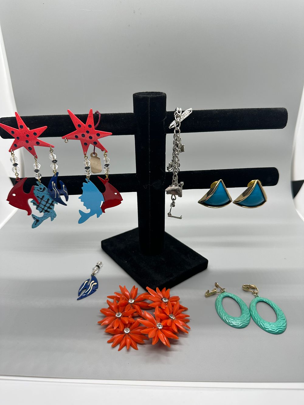 A Collection of Colorful Costume Jewelry. A collection of costume jewelry featuring various 