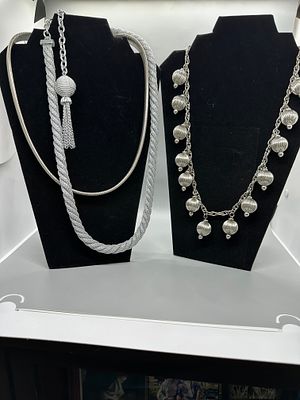 Several Silver-Toned Necklaces with Orb and Tassel Accents. Several silver-toned necklaces 