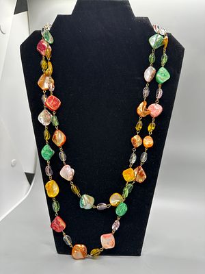Multi-Colored Irregular Bead Necklace on Gold-Tone Chain. A necklace featuring multi-colored 