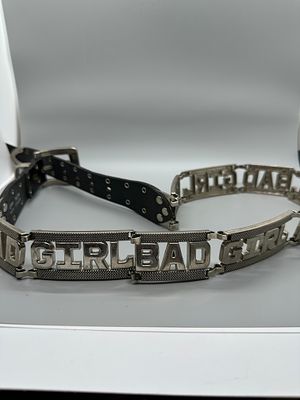 Silver Toned Bad Girl Linked Metal Plate Belt. A silver-toned metal belt featuring linked 