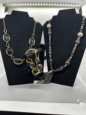 A Trio of Fashion Necklaces and a Bracelet. A trio of jewelry pieces including a beaded necklace 