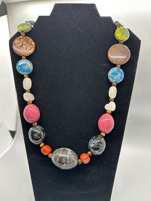 Multi-Colored Large Bead Statement Necklace. A multi-colored necklace featuring a collection of 