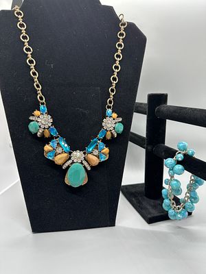 Two-Piece Turquoise and Blue-Toned Costume Jewelry Collection. A gold-tone bib necklace set with 