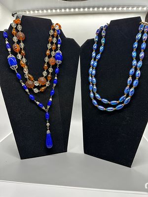 A Collection of Blue Orange and Clear Beaded Necklaces. A collection of beaded necklaces 