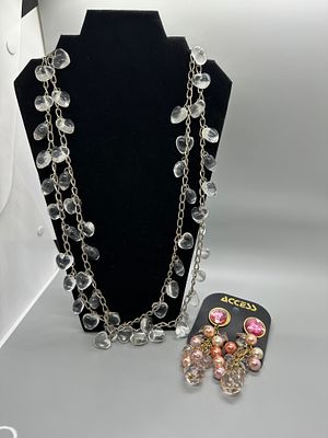 Two Pieces of Fashion Jewelry. A silver-tone chain necklace featuring clear heart-shaped charms 