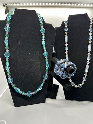A Trio of Beaded Jewelry Items. A trio of jewelry items including two beaded necklaces and one 