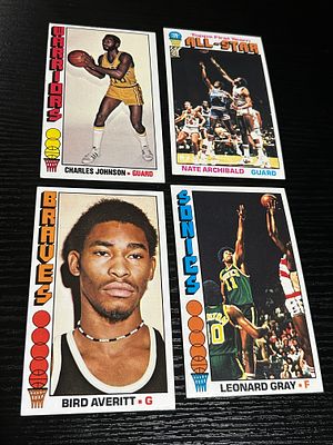 A Collection of Four 1976-77 Topps Basketball Trading Cards. A collection of four vintage 