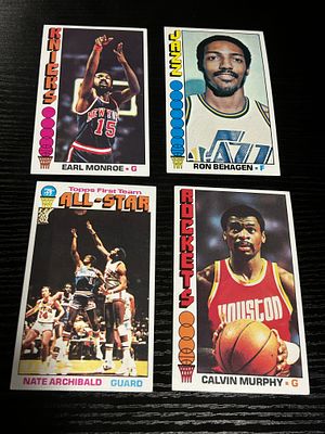 A Group of Four 1976-77 Topps Basketball Cards Including Hall of Famers. Topps basketball 