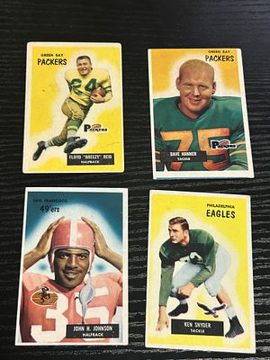 A Collection of Four 1956 Topps Football Trading Cards. A collection of four 1956 Topps football 