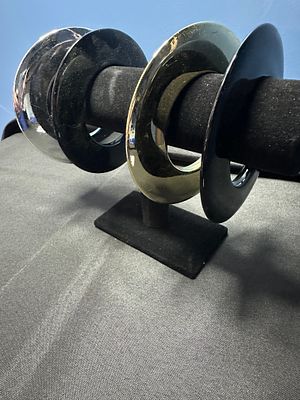 Wide Domed Bangle Bracelets. A set of wide, domed bangle bracelets featuring a continuous puffed 