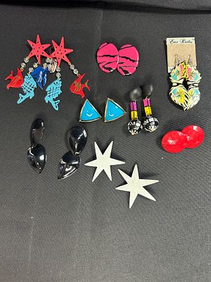 Vintage Costume Earrings. A collection of eight pairs of vintage fashion earrings from the late 