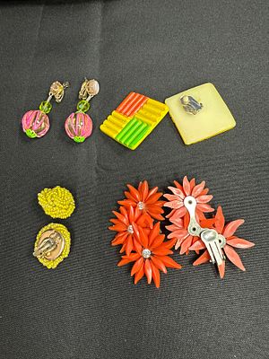Vintage Costume Clip-On Earrings. A collection of four pairs of mid-20th century costume jewelry 