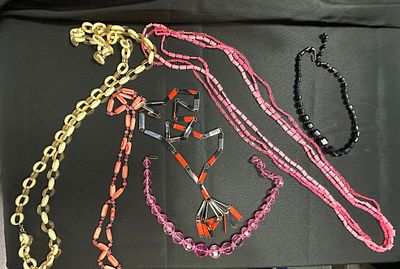 Mid-Century Costume Jewelry Necklaces. A collection of vintage costume jewelry necklaces 