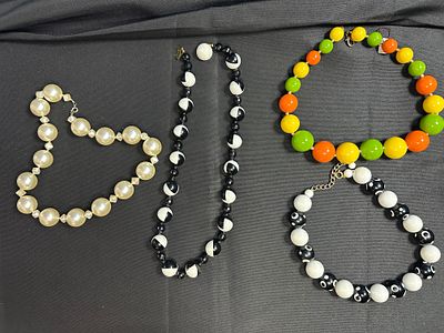 Four Beaded Fashion Necklaces. An assortment of four beaded fashion necklaces, mid-to-late 20th 