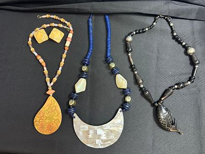 Beaded Pendant Necklaces and Matching Earrings. A collection of vintage-style beaded pendant 