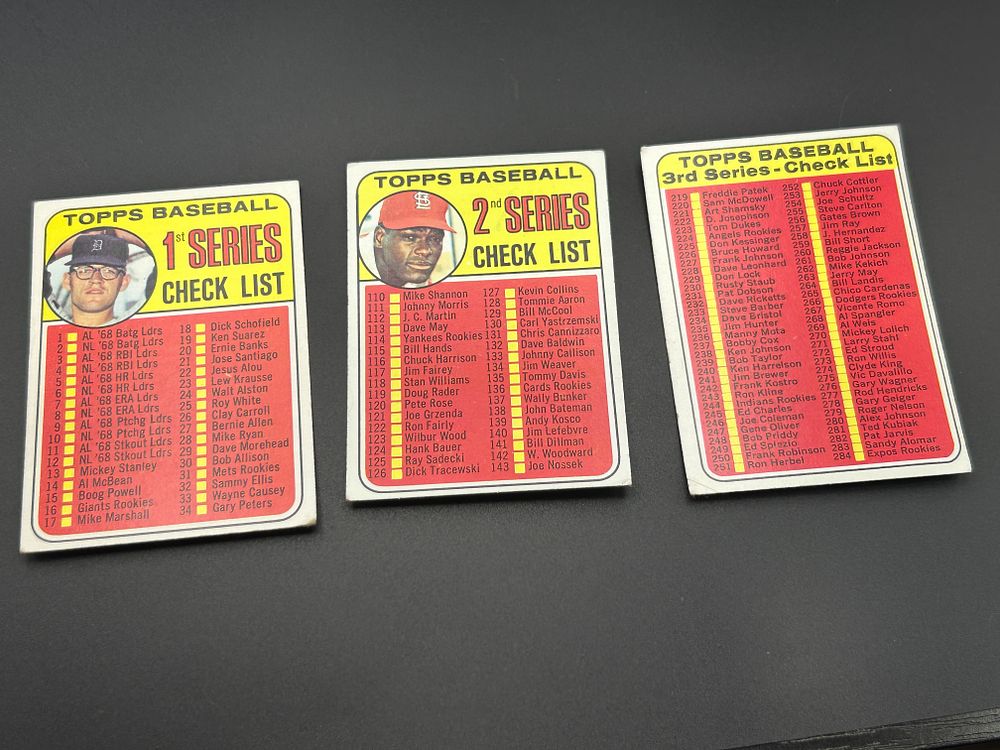 Lot 180: A Trio of 1969 Topps Baseball Checklist Cards, Series 1-3, Numbers 57, 107, and 214