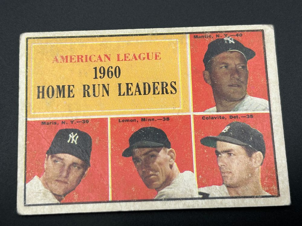 Lot 223: 1961 Topps #44 American League 1960 Home Run Leaders Mickey Mantle and Roger Maris